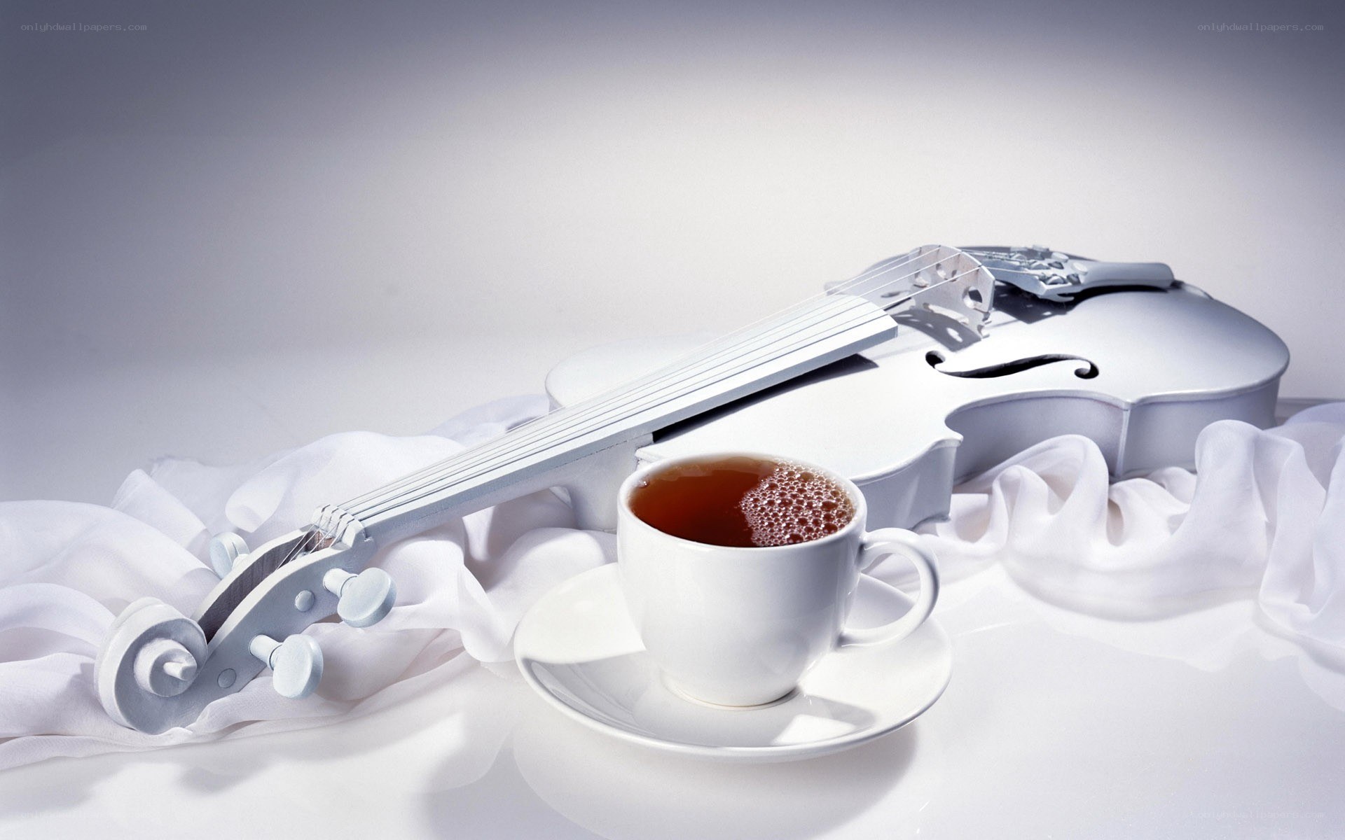 Violin and tea cup