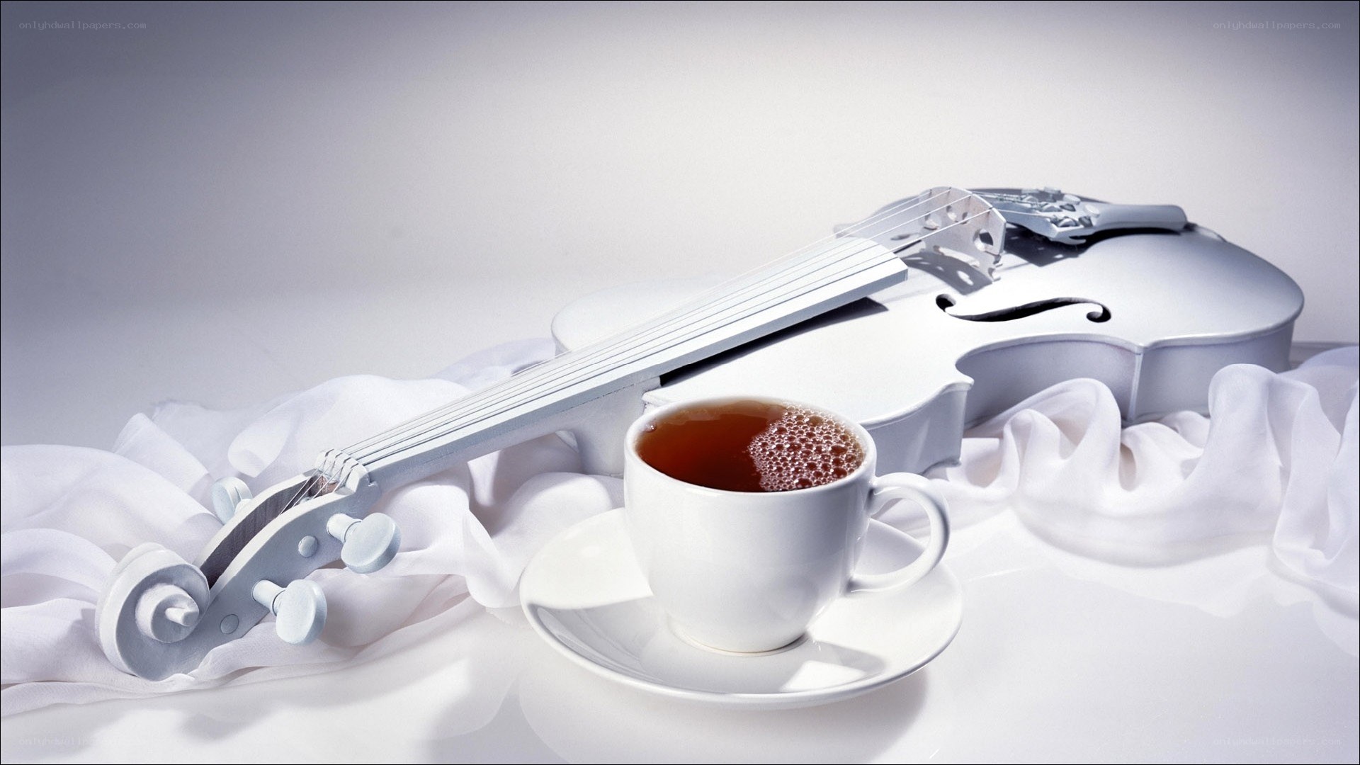 Violin and tea cup