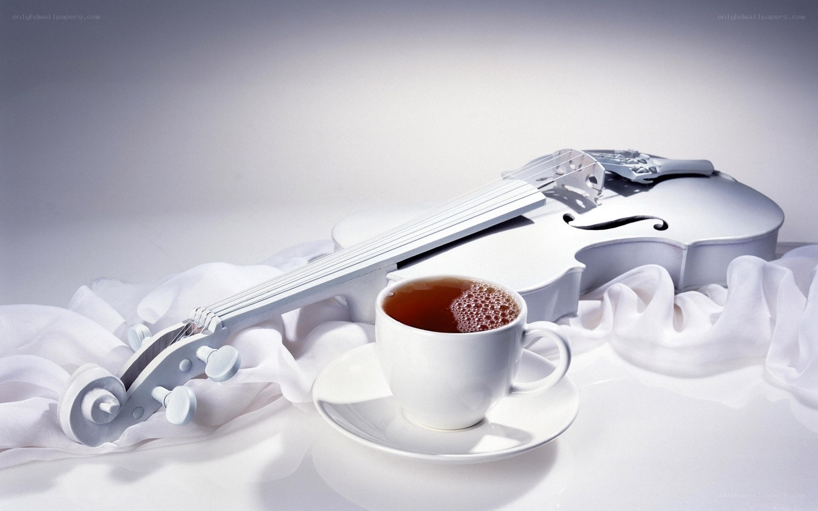 Violin and tea cup