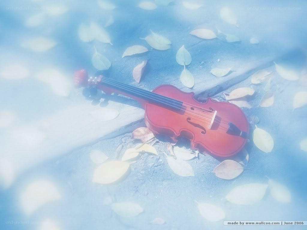 Violin on leaves in blue light