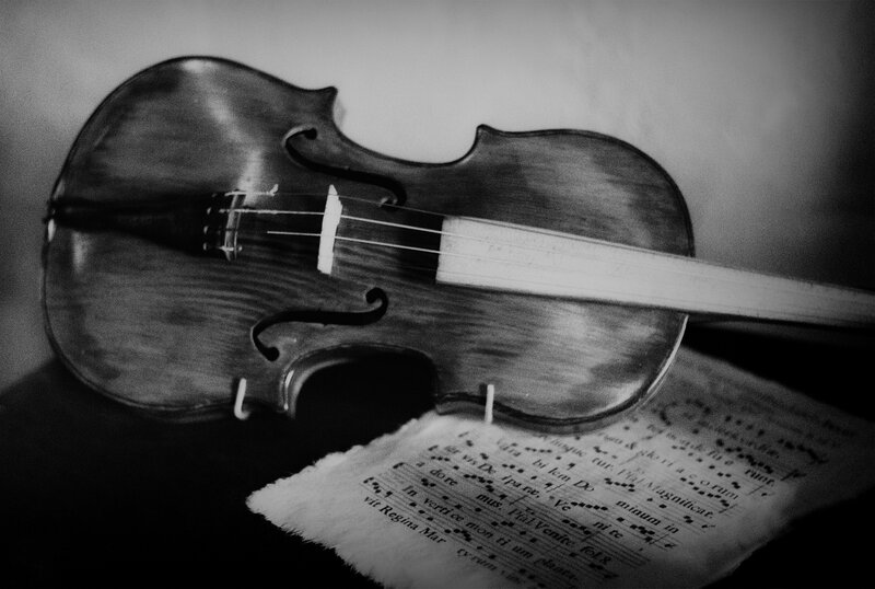 Violin on Sheet Music — Black, Dramatic, Photograph