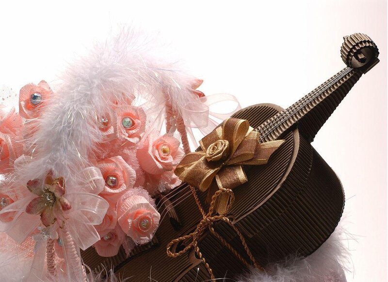 Violin-shaped gift box with flowers