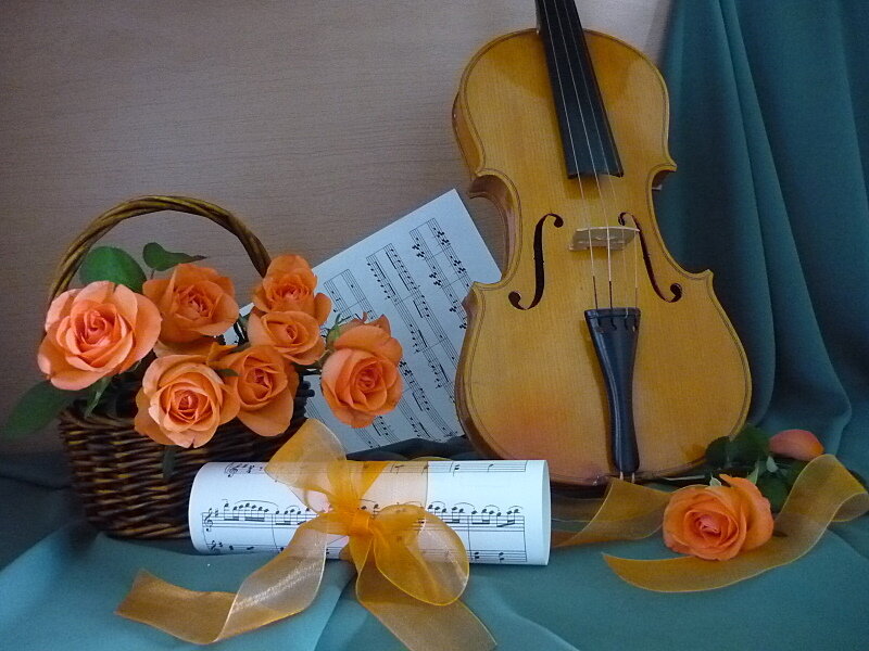 Violin with roses and sheet music