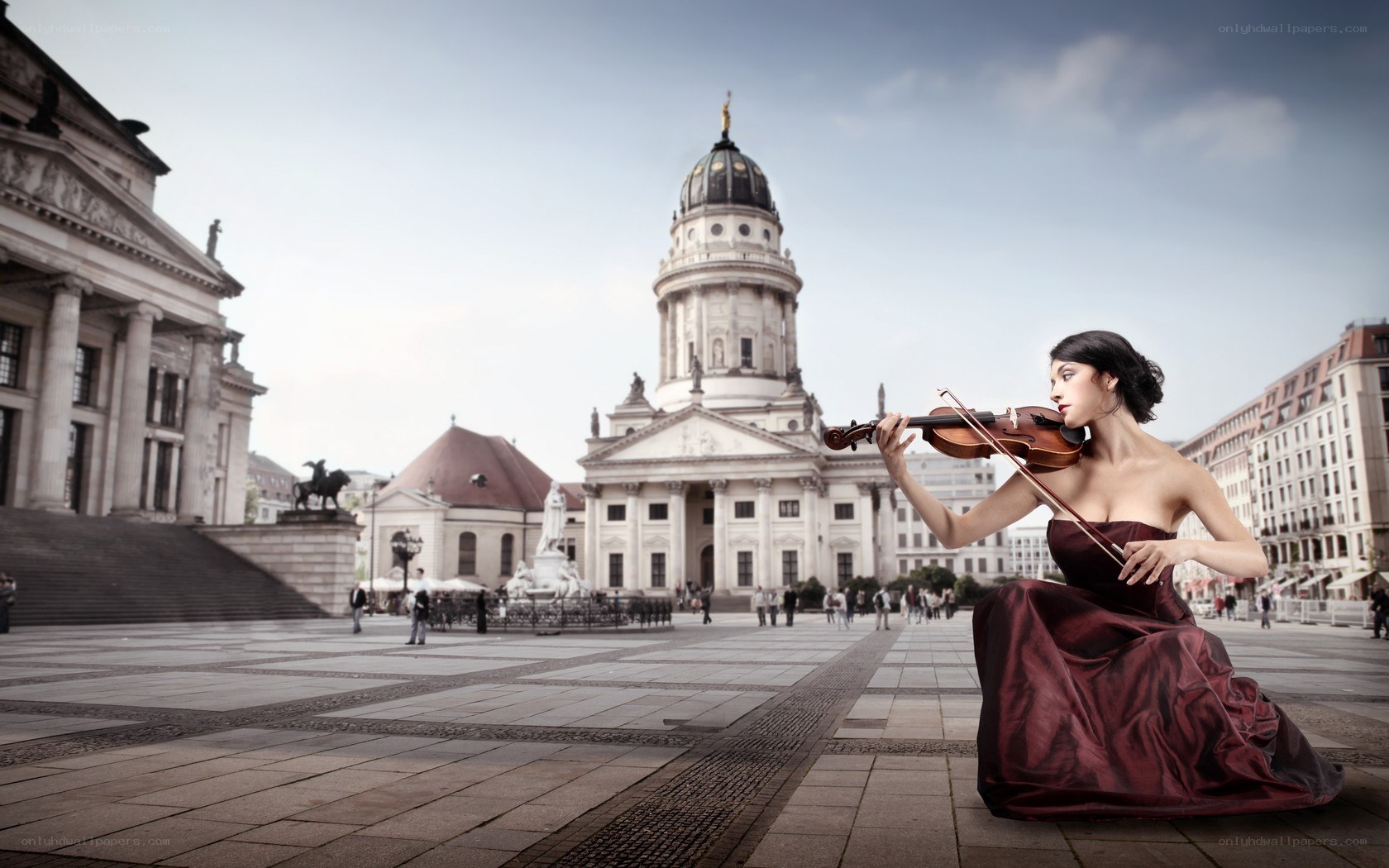 Violinist in a city square