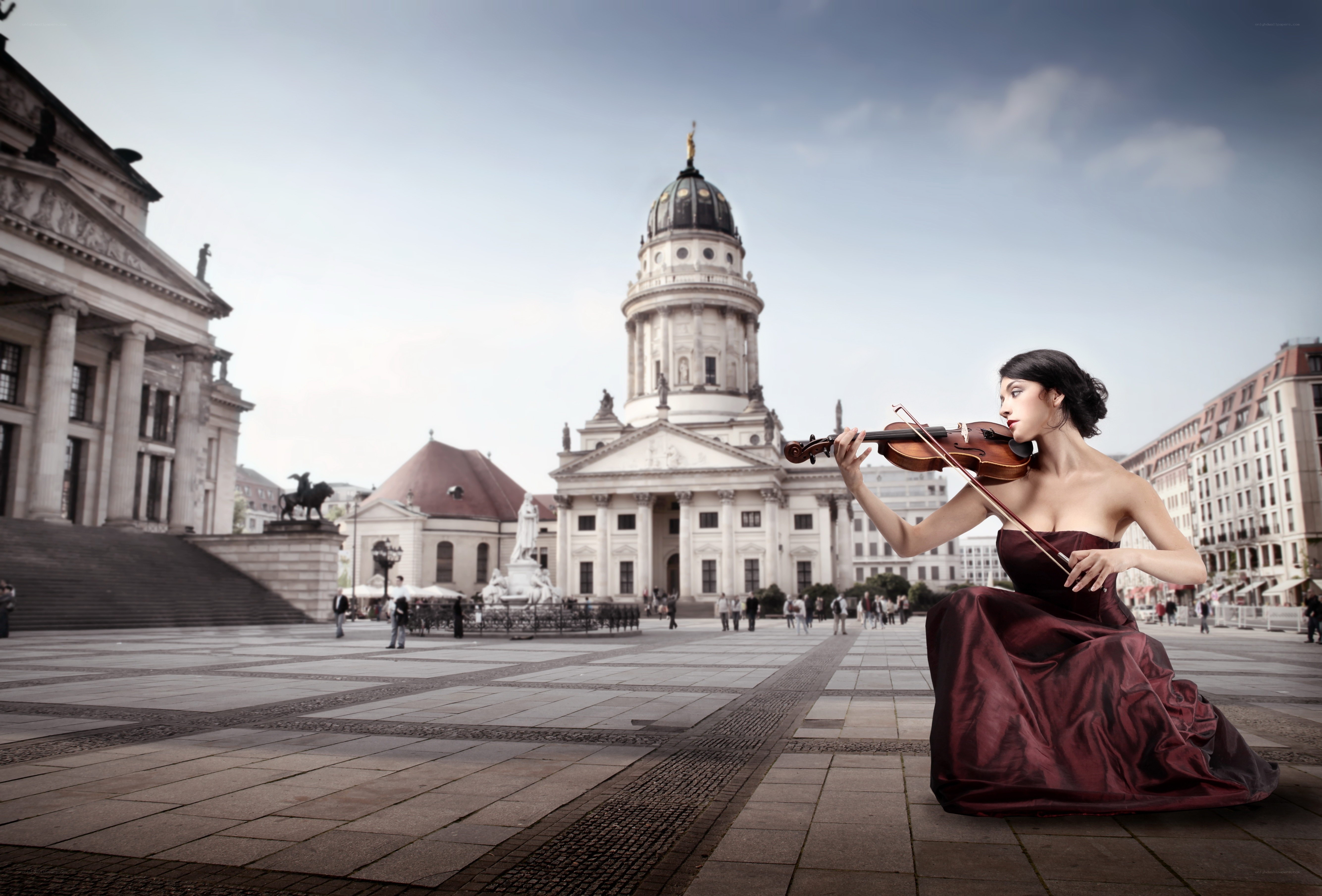 Violinist in a city square