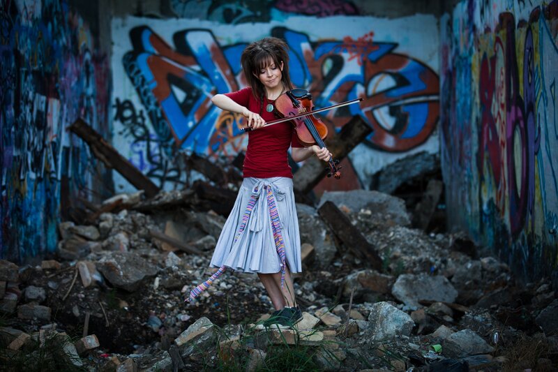 Violinist in a graffiti alley