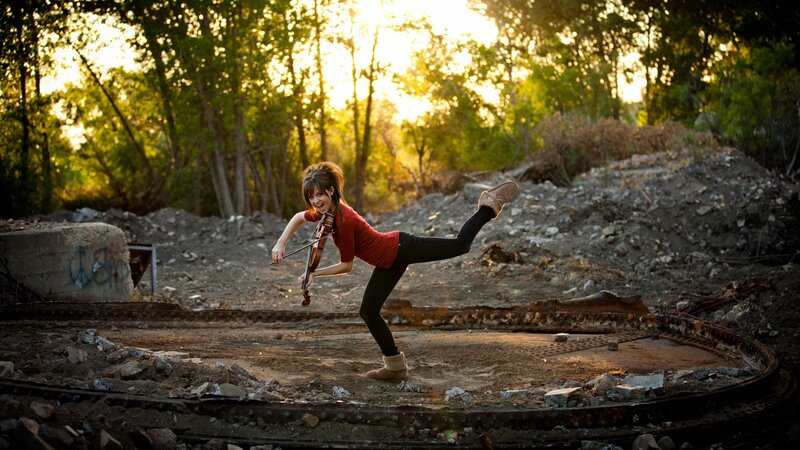 Violinist in a junkyard