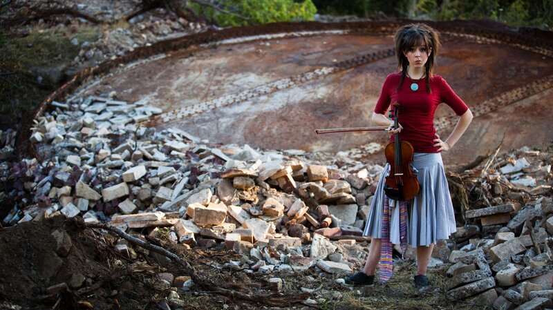 Violinist in a ruined landscape