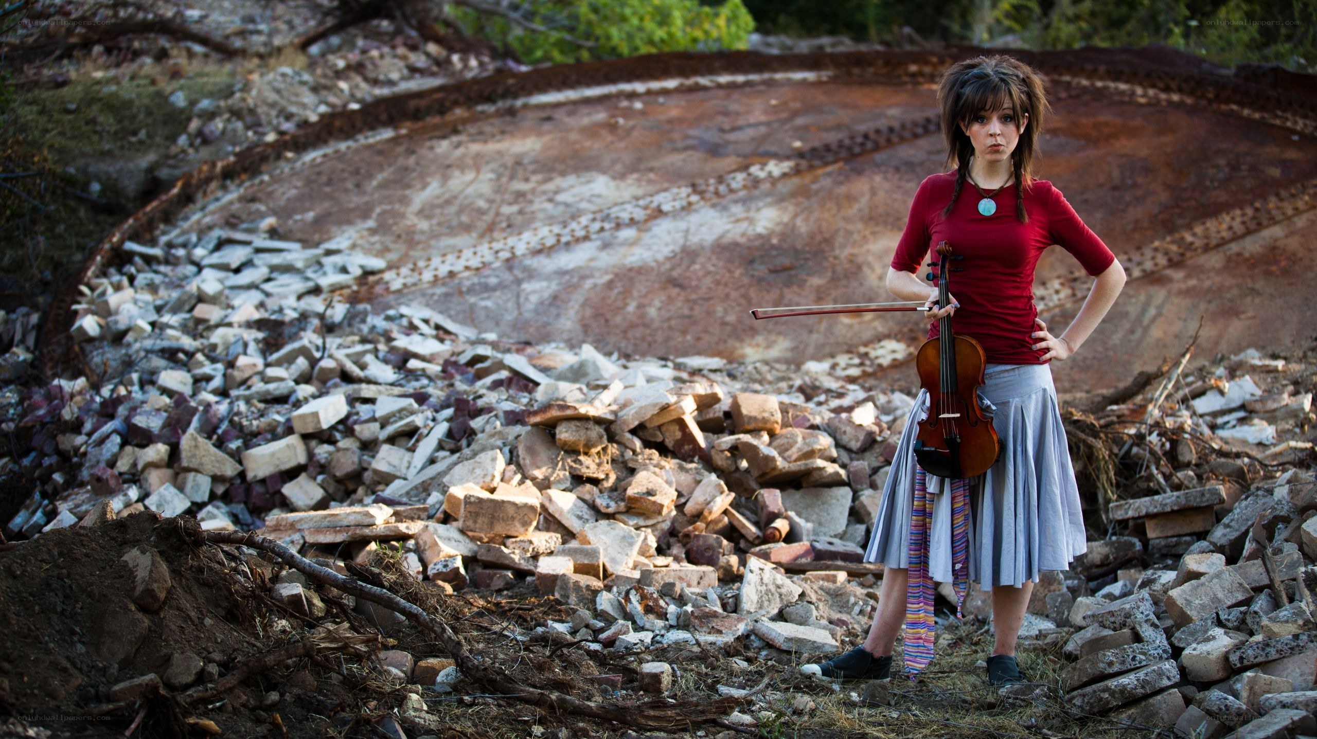 Violinist in a ruined landscape