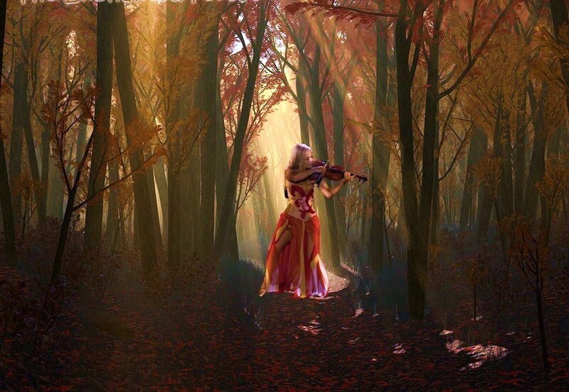 Violinist in autumn forest