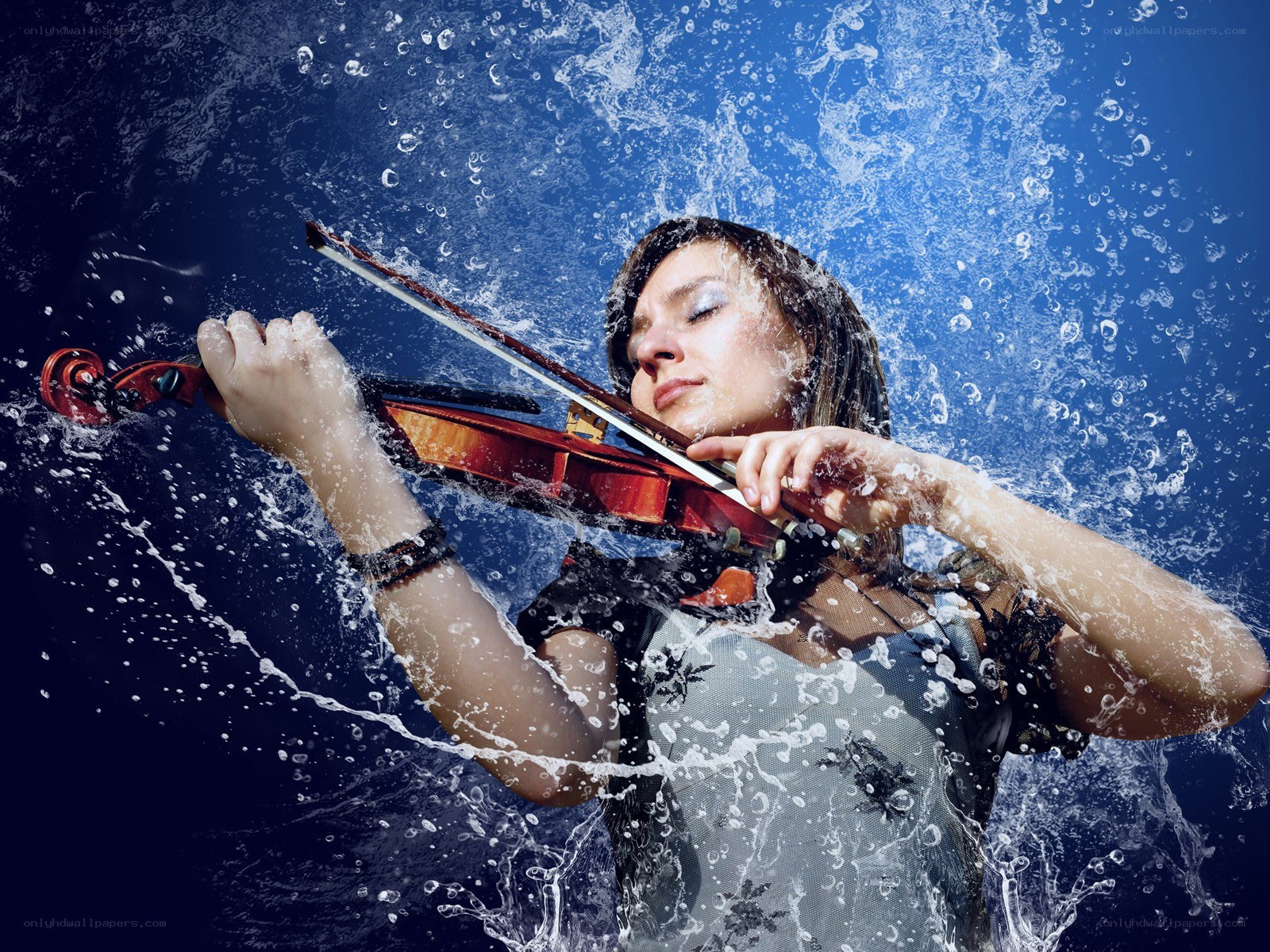 Violinist in splashing water