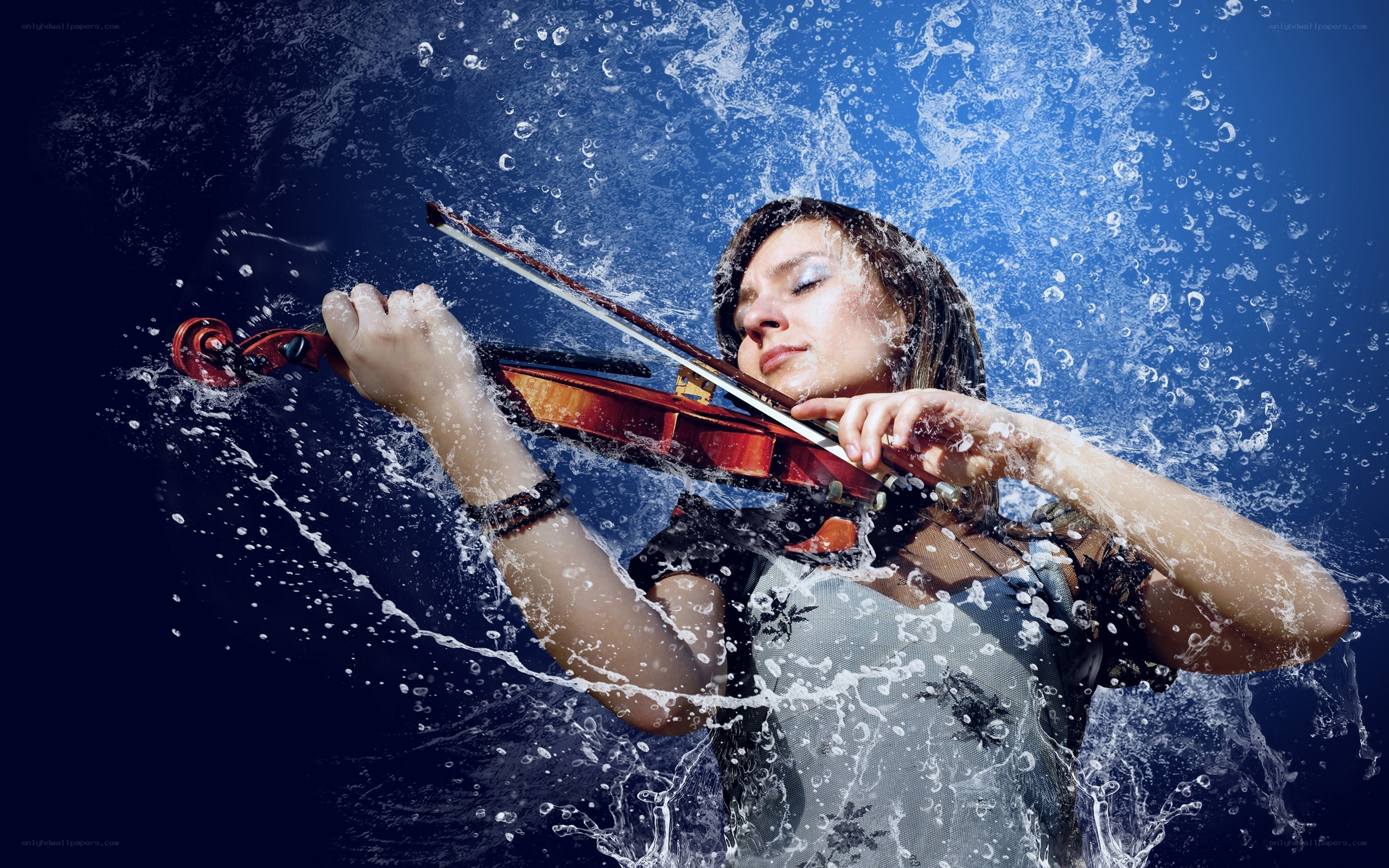 Violinist in water splashes