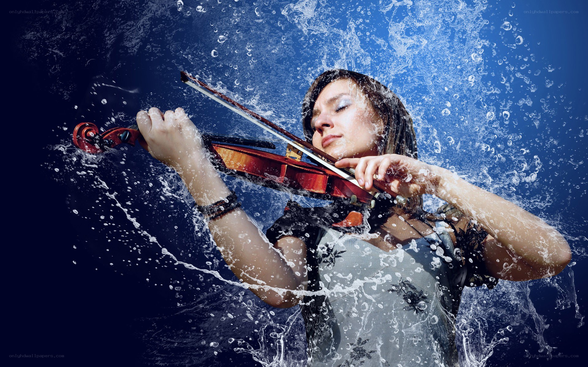 Violinist in water splashes