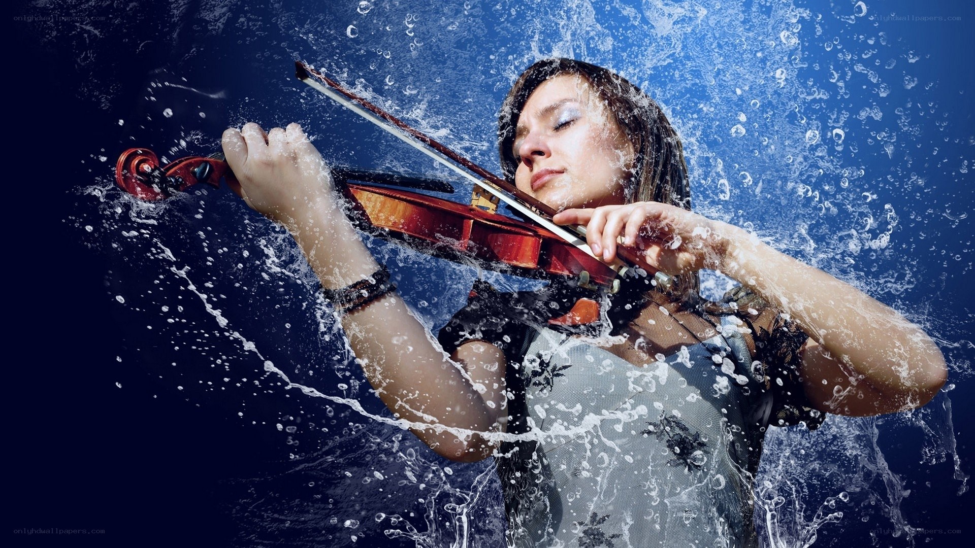 Violinist in water splashes