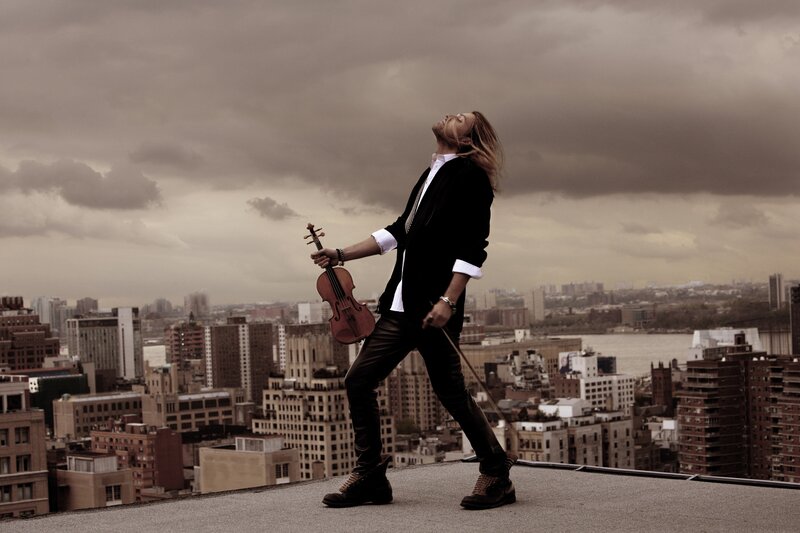 Violinist on a rooftop