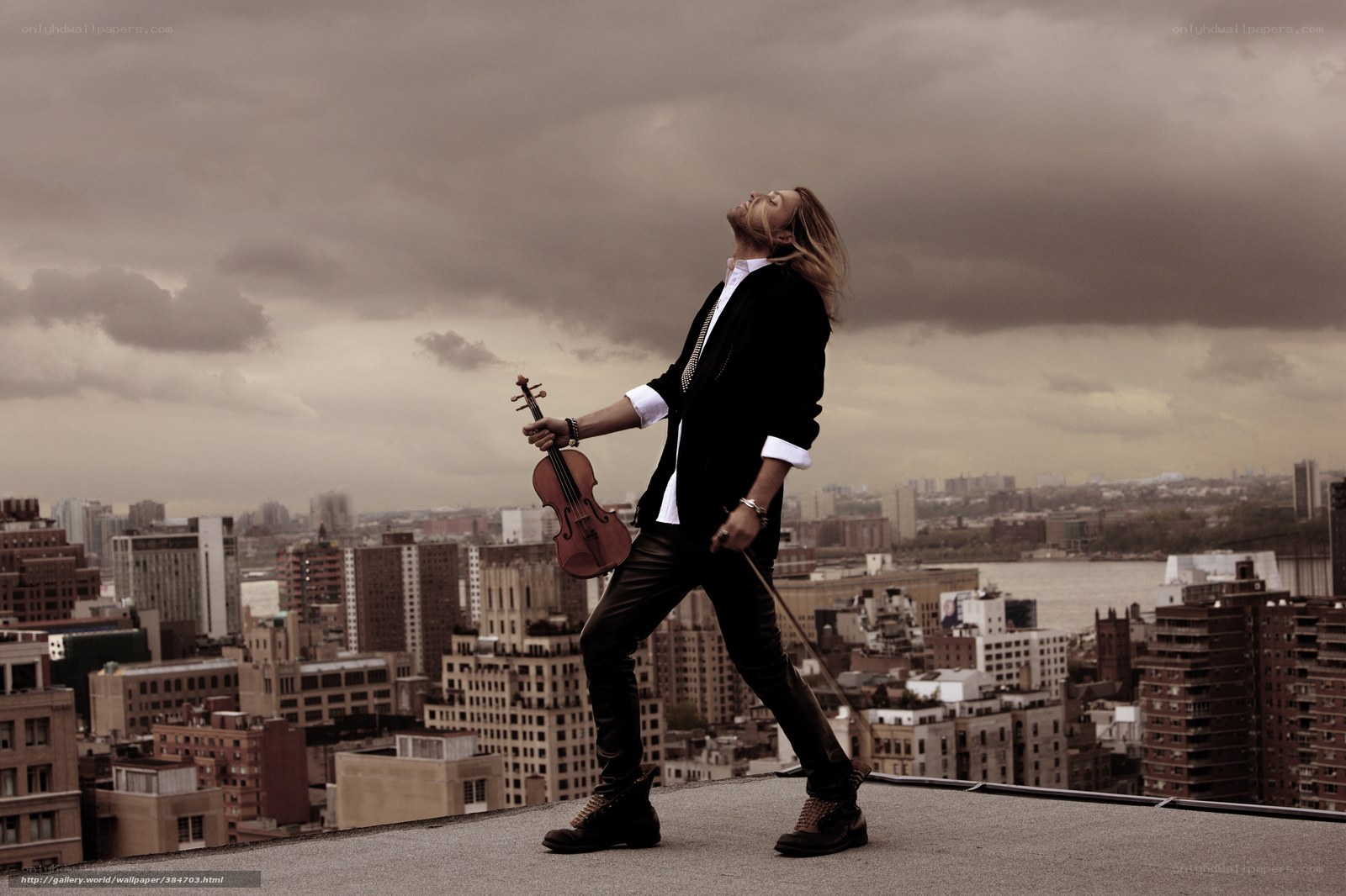 Violinist on a rooftop
