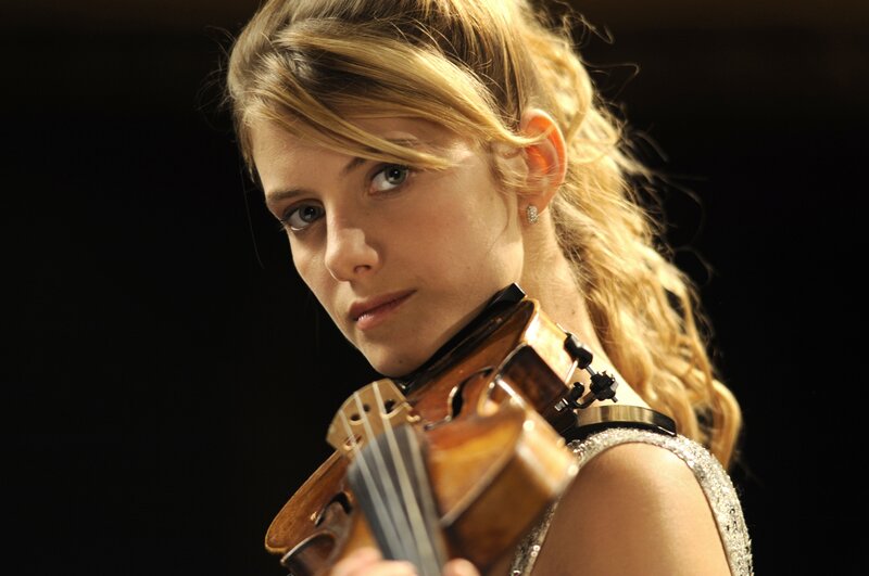 Violinist performing on stage