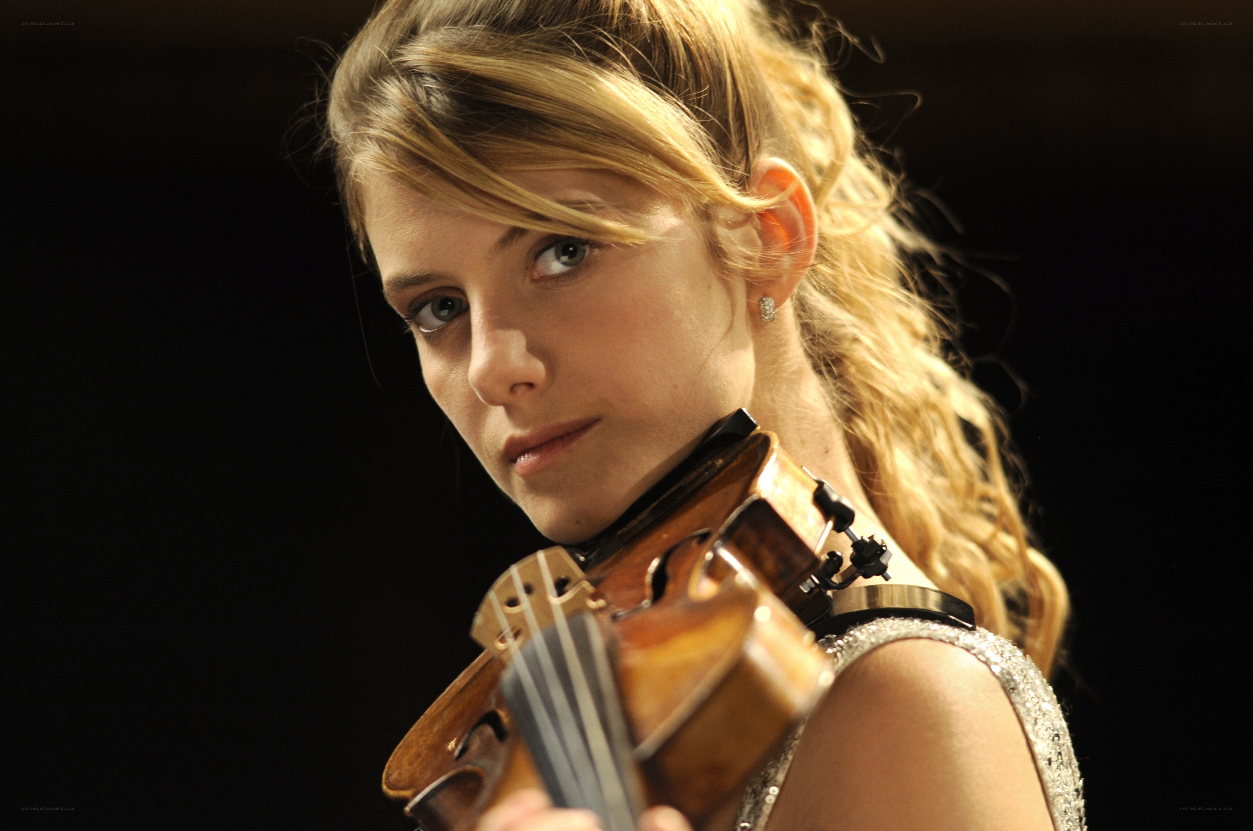 Violinist performing on stage