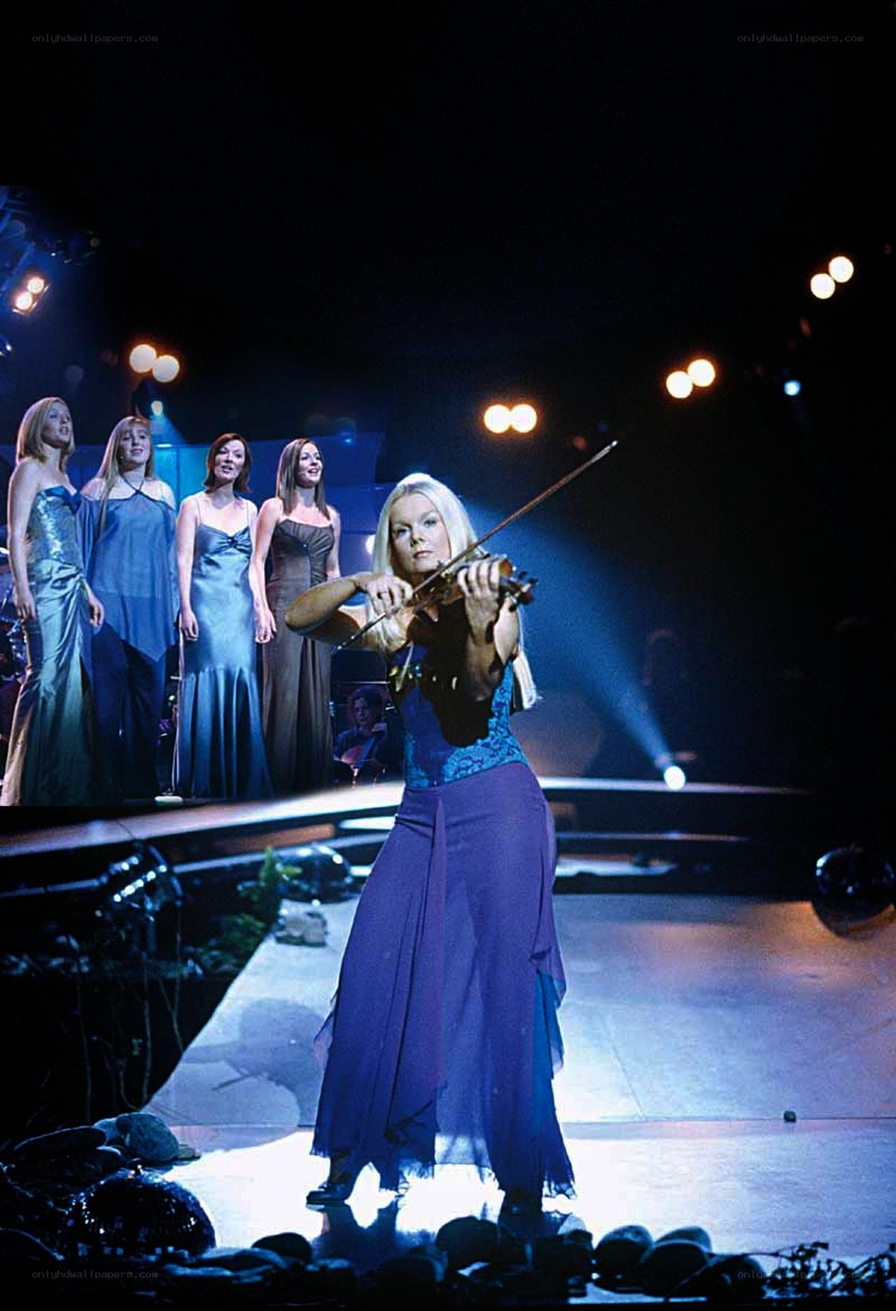 Violinist performing on stage