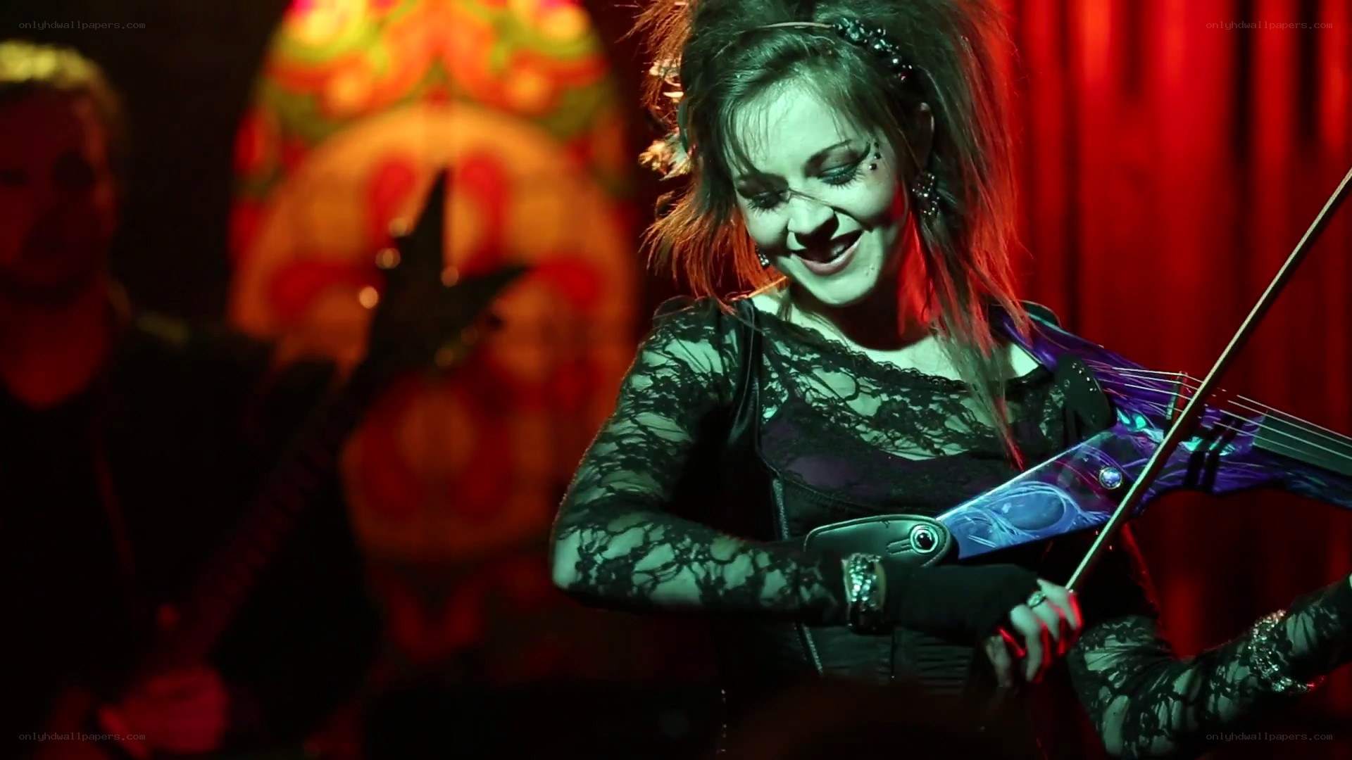 Violinist performing on stage