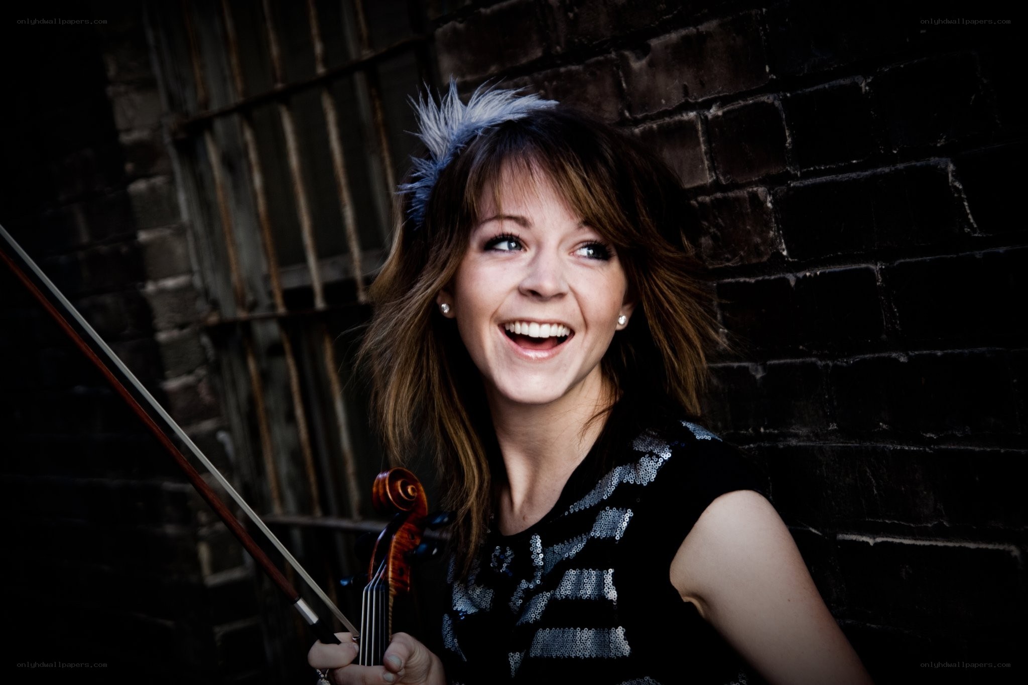 Violinist with feathered headband