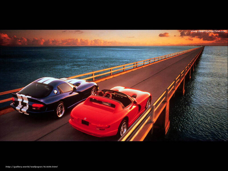 Viper cars on a bridge at sunset