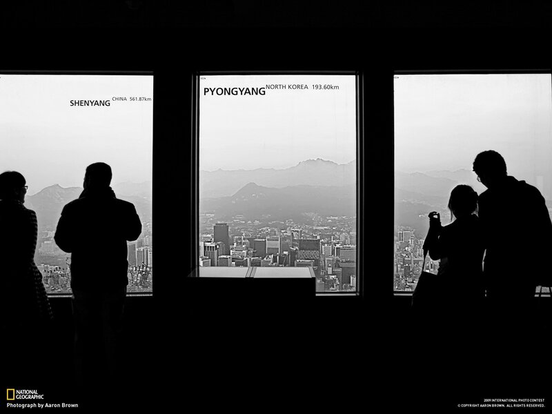 Visitors view city from observation deck