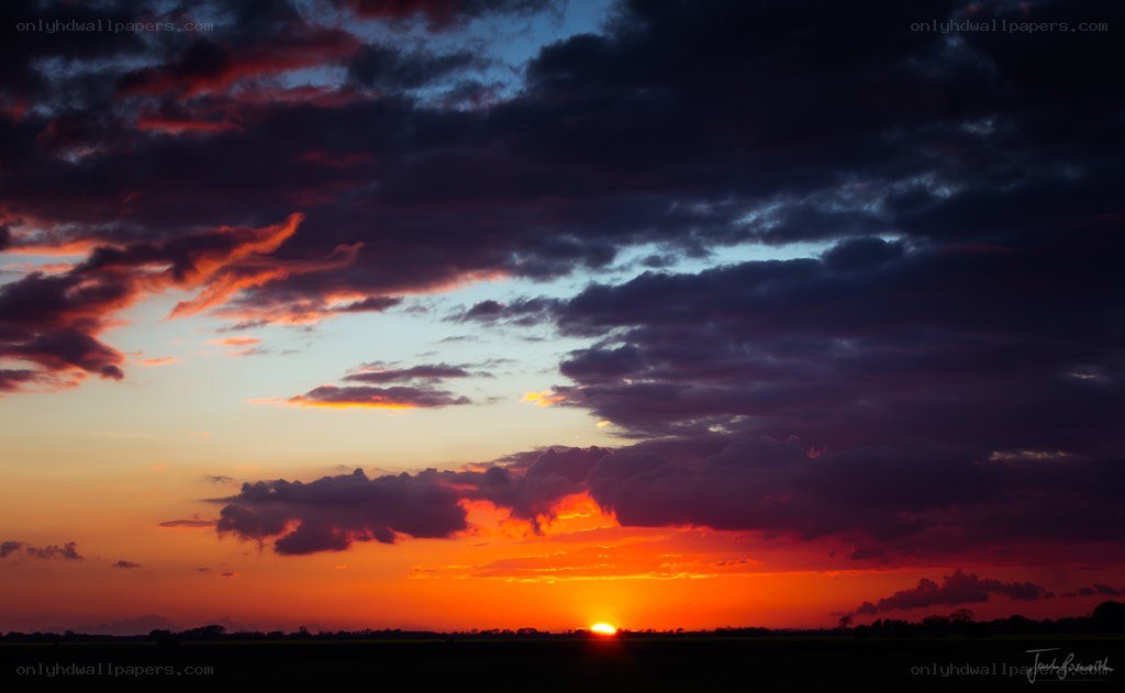 Vivid sunset over a field