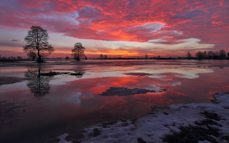 Vivid sunset over a frozen lake