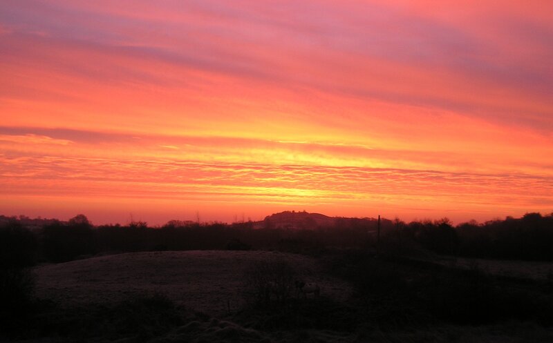 Vivid sunset over a rural landscape