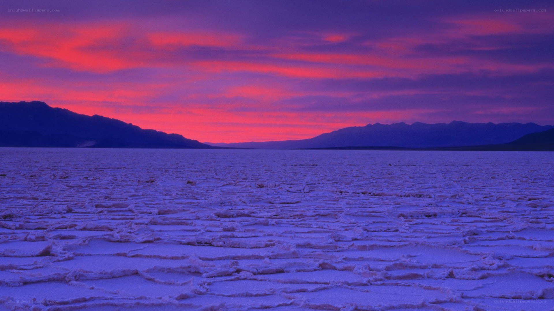 Vivid sunset over salt flats