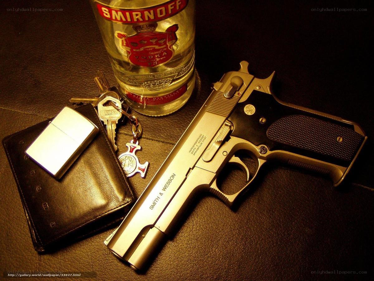 Vodka and handgun on leather