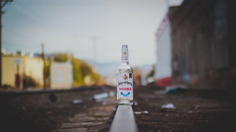 Vodka Bottle on Rail
