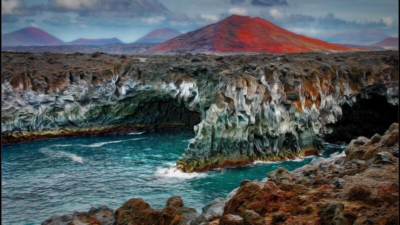 Volcanic Coastline with Sea Cave — Red