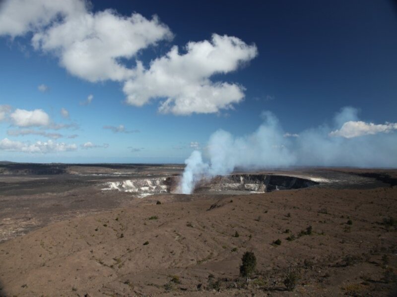 Volcanic Crater Emitting Smoke