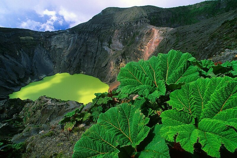 Volcanic crater lake with green water