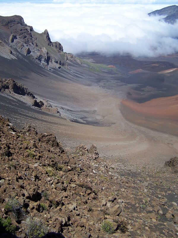 volcanic crater with colorful slopes