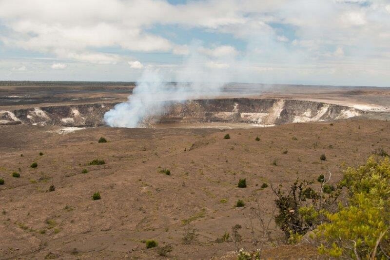 Volcanic Crater with Smoke — Brown