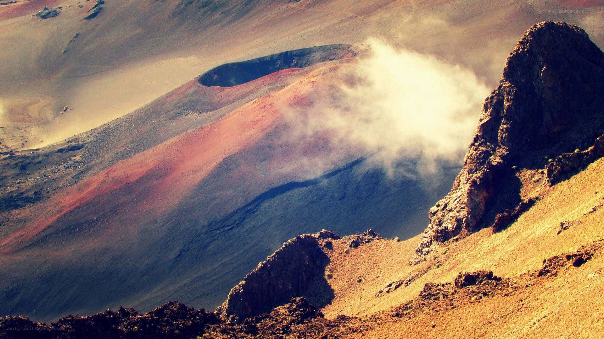 volcanic crater with smoke
