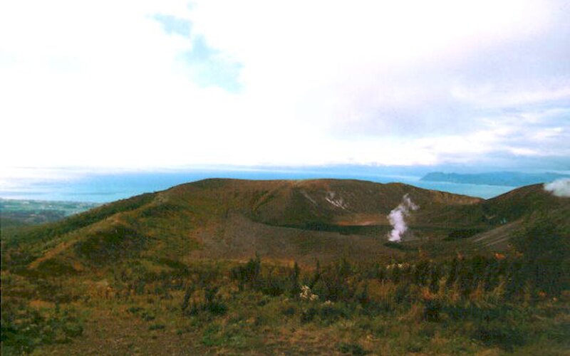 volcanic crater with steam