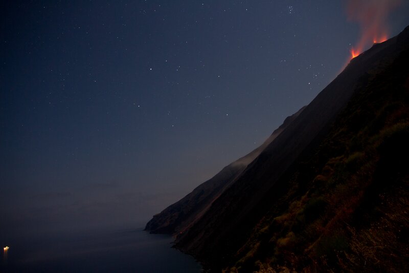 Volcanic Eruption at Night — Black, Dramatic, Photograph, Mountain, Ocean