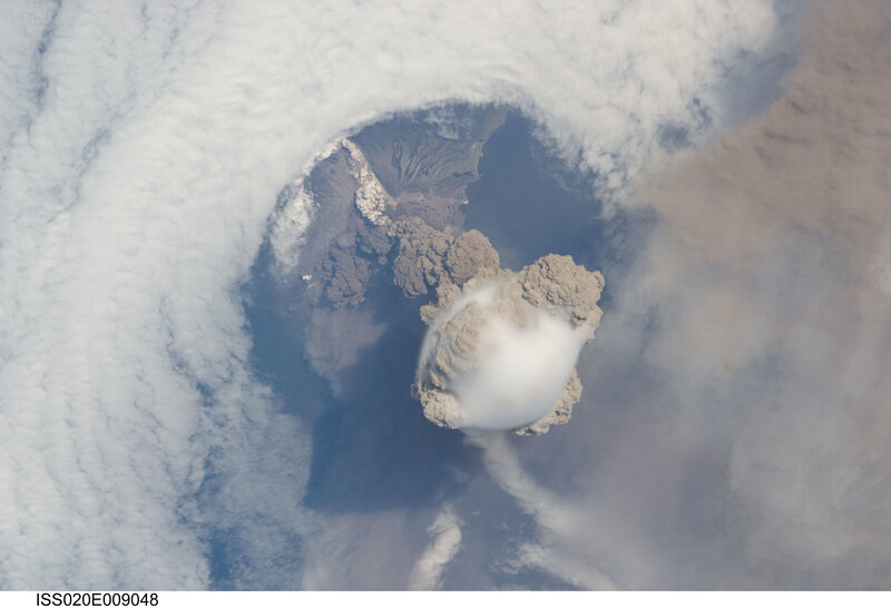 Volcanic Eruption from Space — Gray