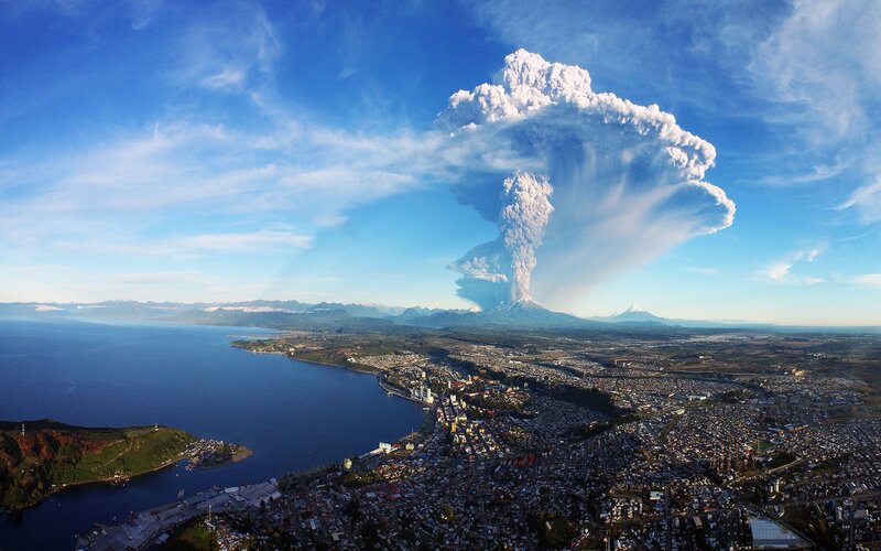 Volcanic Eruption over City — Blue