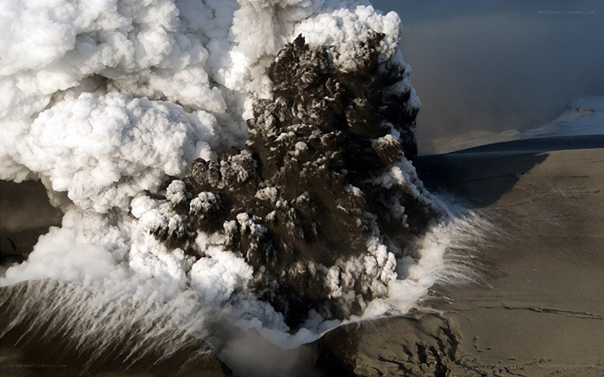 Volcanic eruption with ash plume