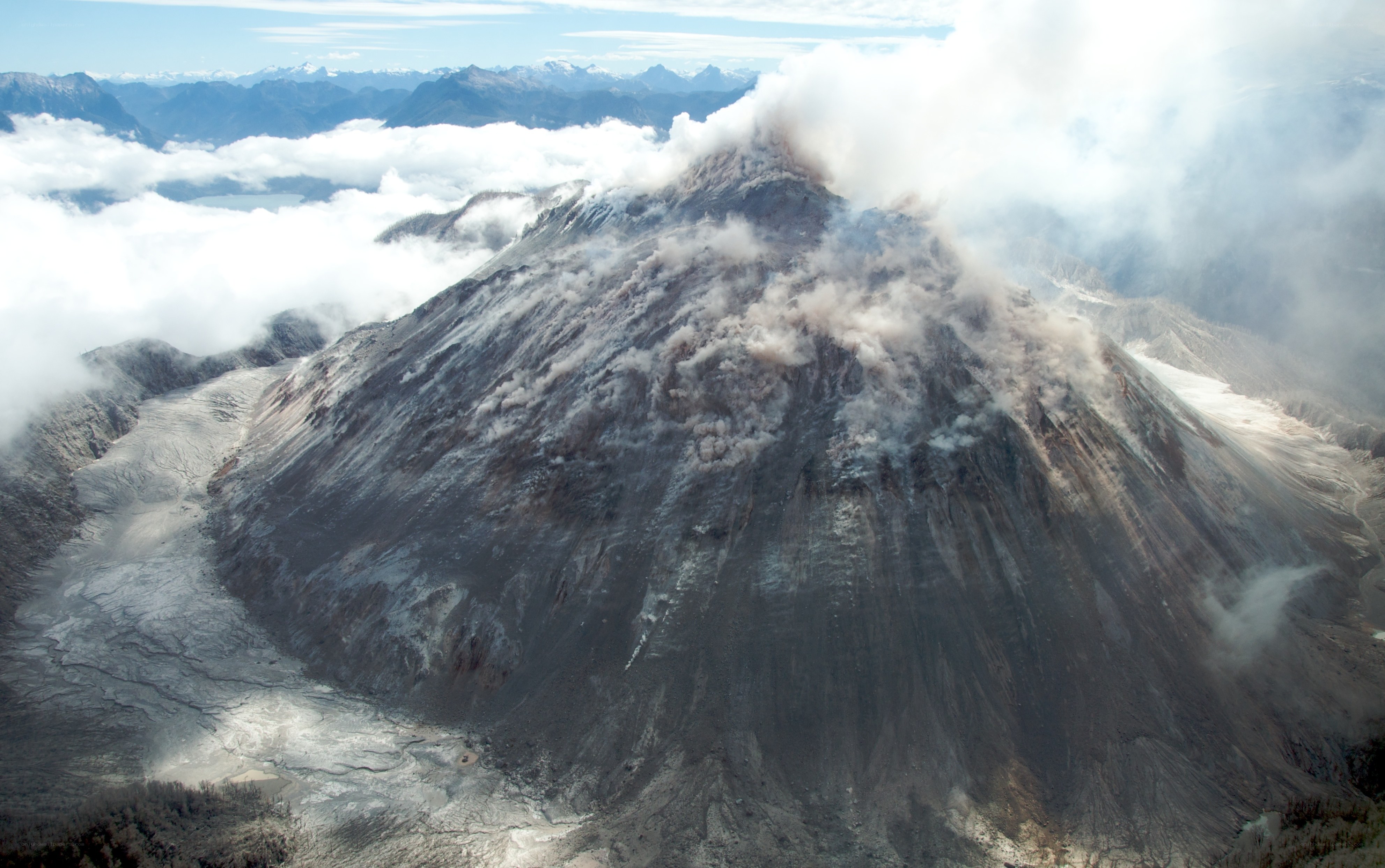 volcanic eruption with ash plume