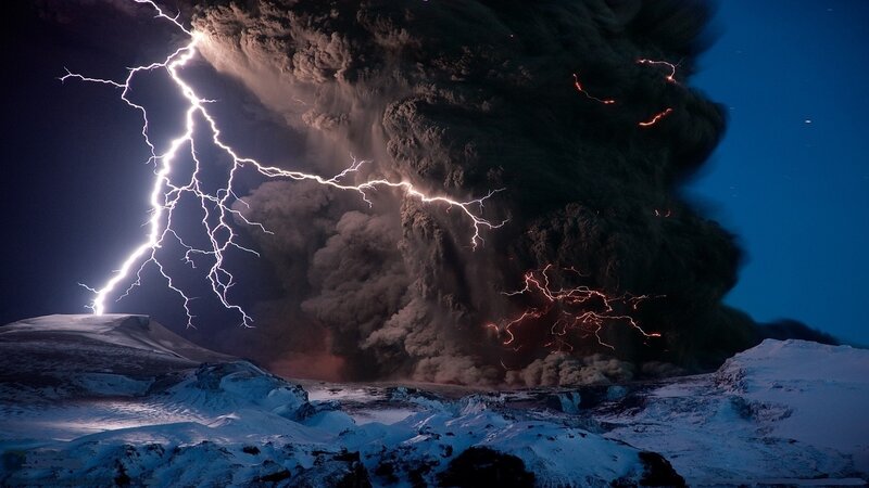 Volcanic Eruption with Lightning — Black, Dramatic, Night, Photograph, Ash Cloud, Snow-covered Ground