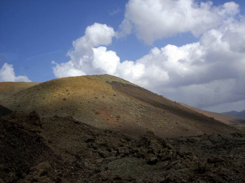 Volcanic Hill under Clouds
