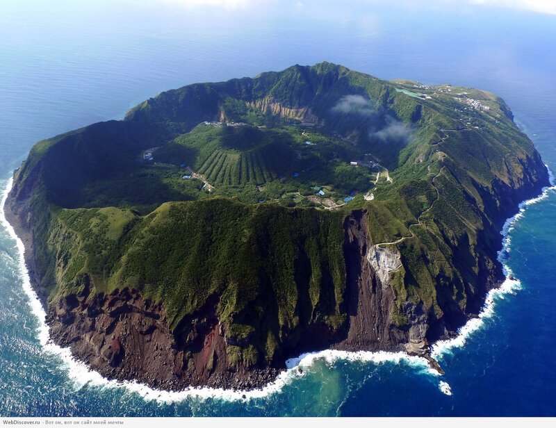 Volcanic Island from Above — Green, Serene