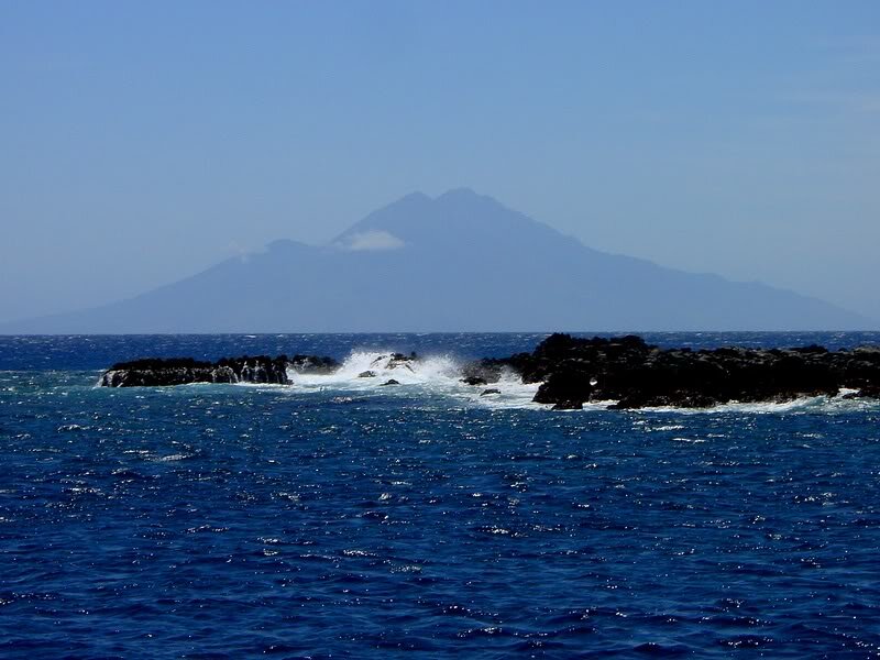 Volcanic Island in Ocean — Blue, Serene