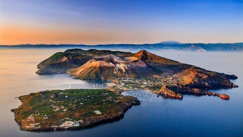 Volcanic Island in Sea — Blue, Serene